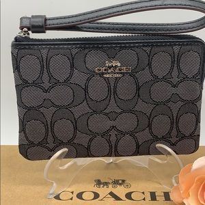 COACH Corner Zip Wristlet In Signature Canvas